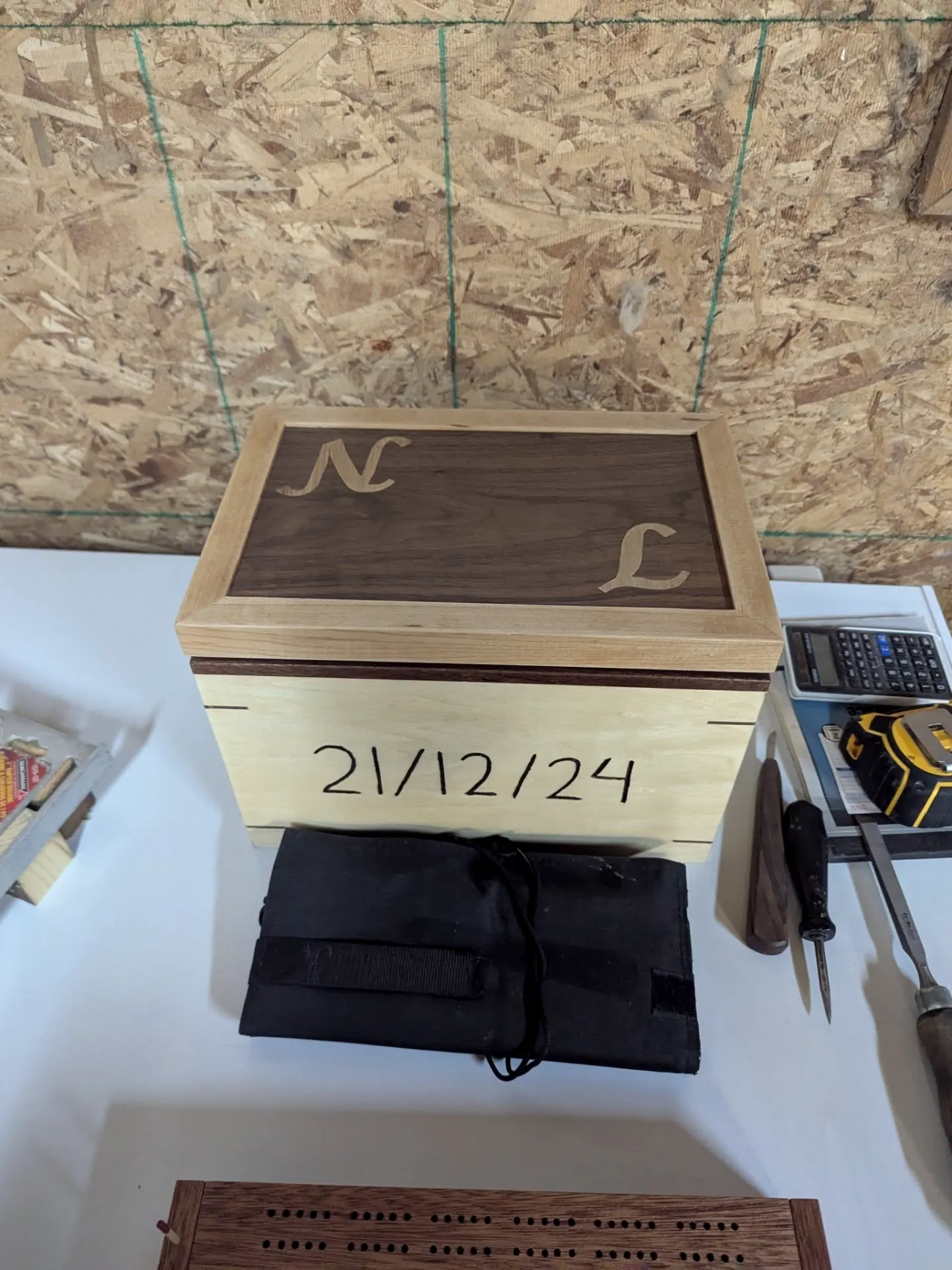 Keepsake box lid with N and L and a date