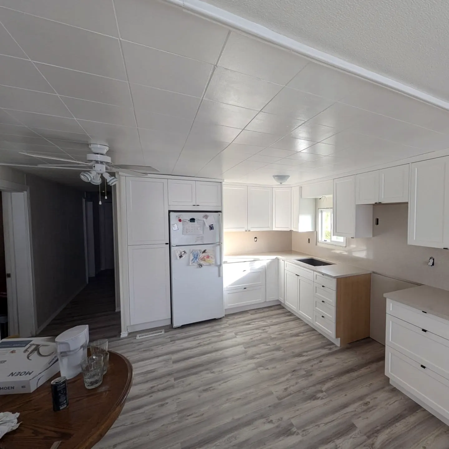 Bright white kitchen in an open plan