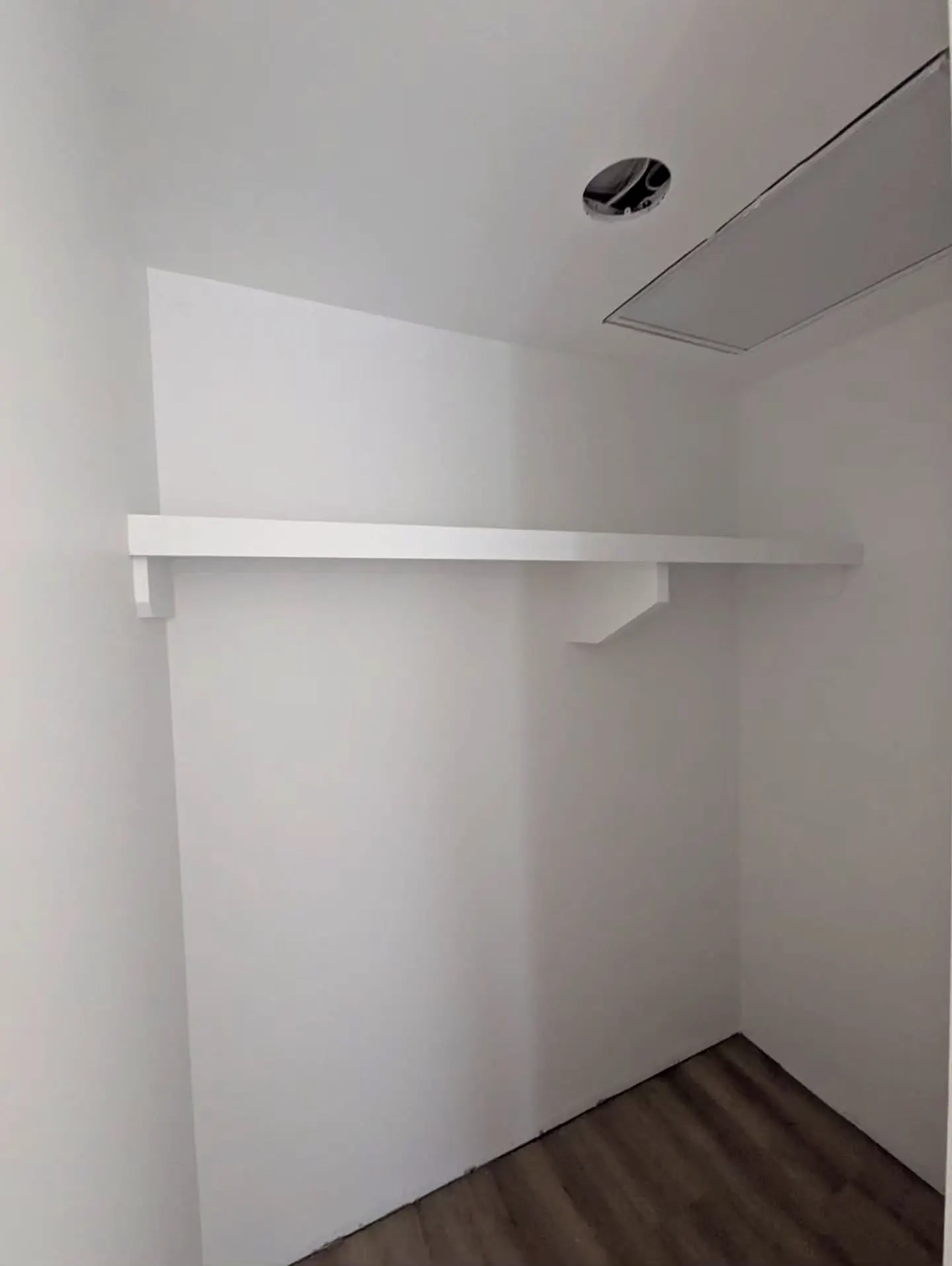 Floating shelf in a closet