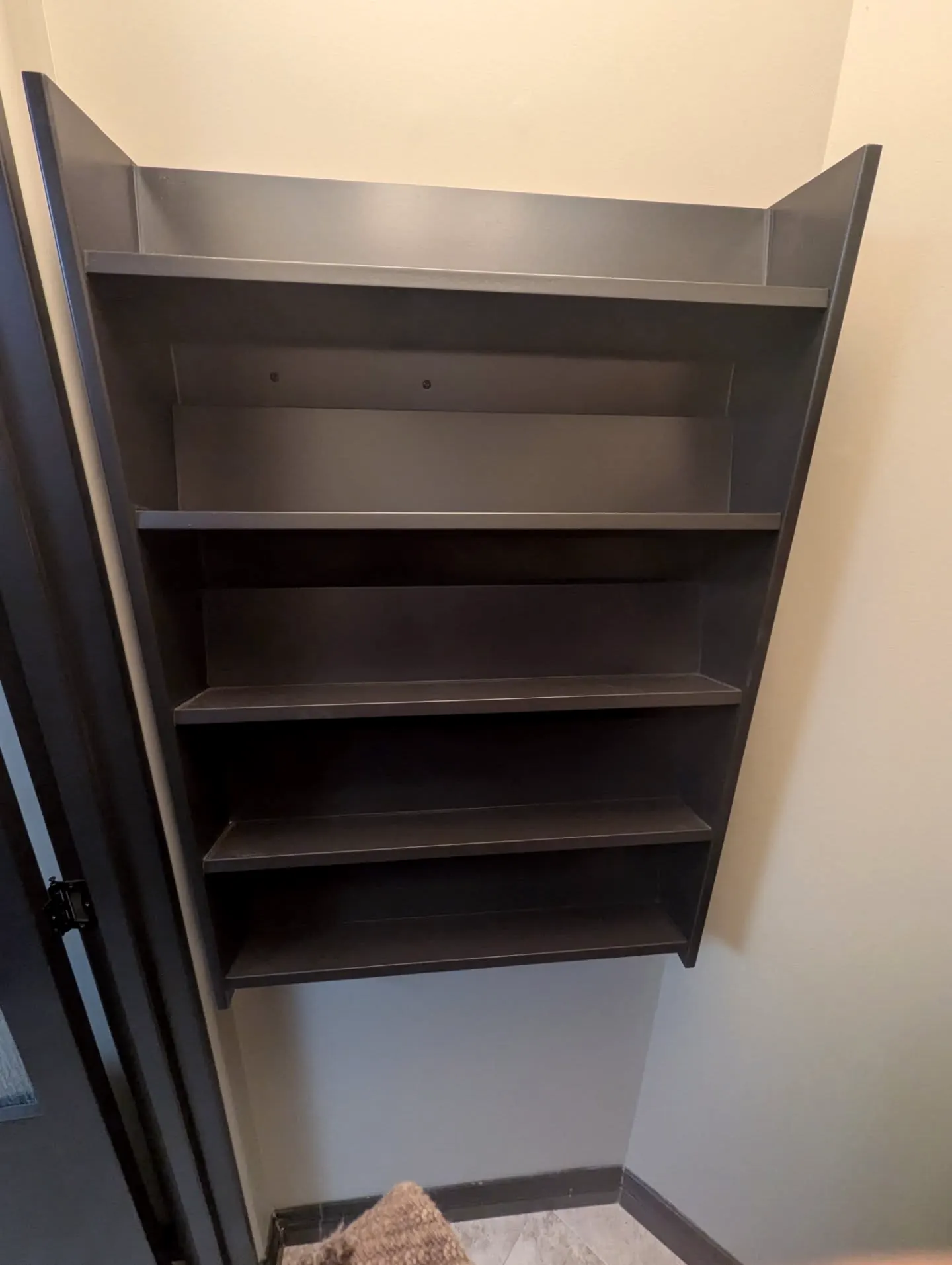 Dark stained pantry shelves