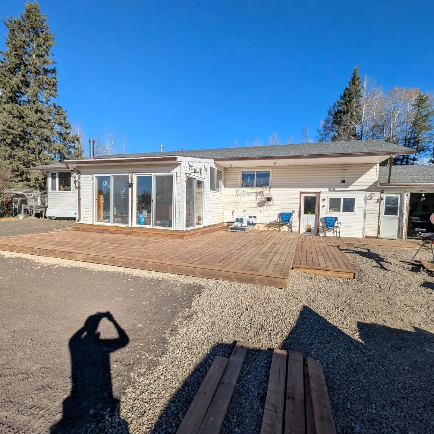 After: Finished deck across the full back of the house
