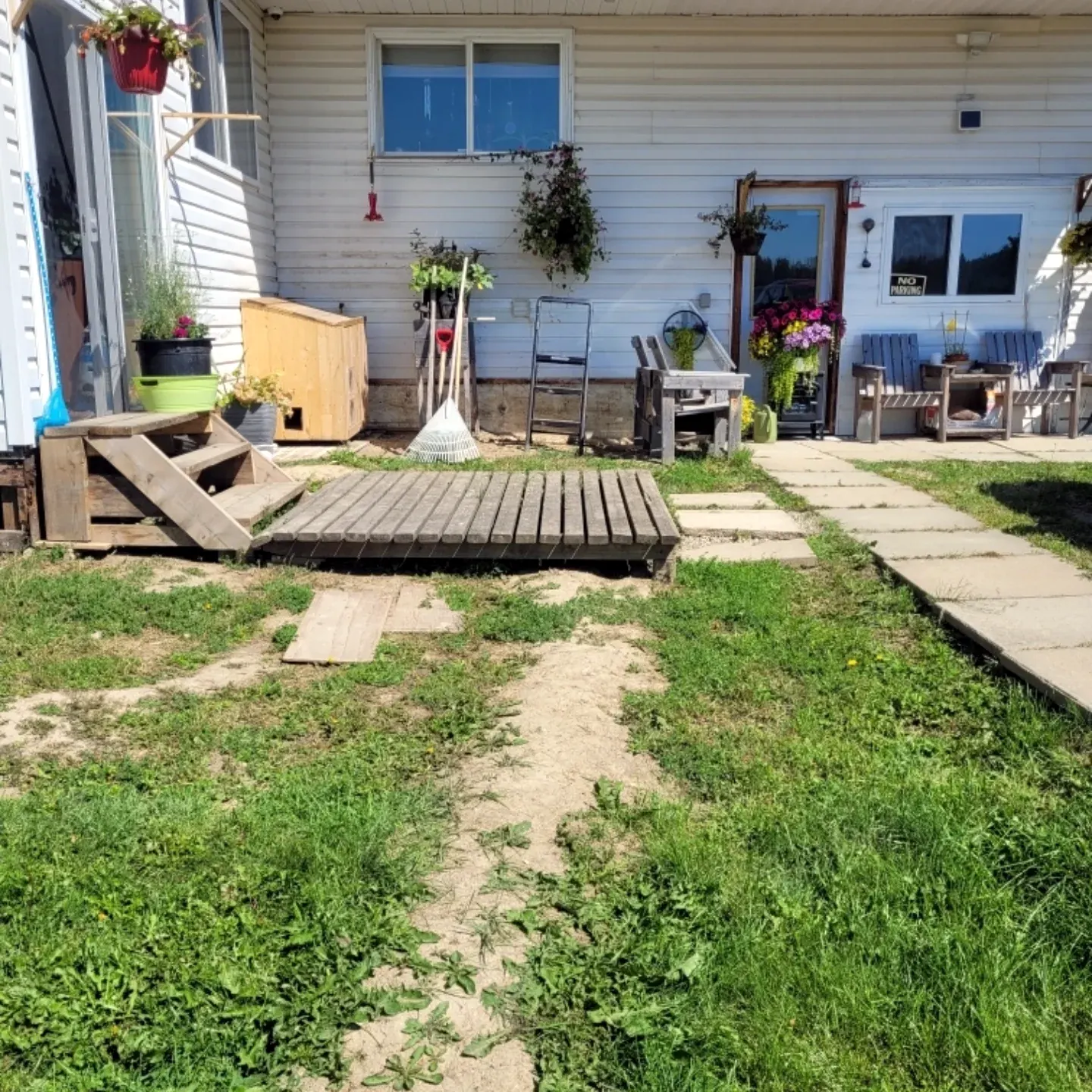 Before: old step platforms on the lawn