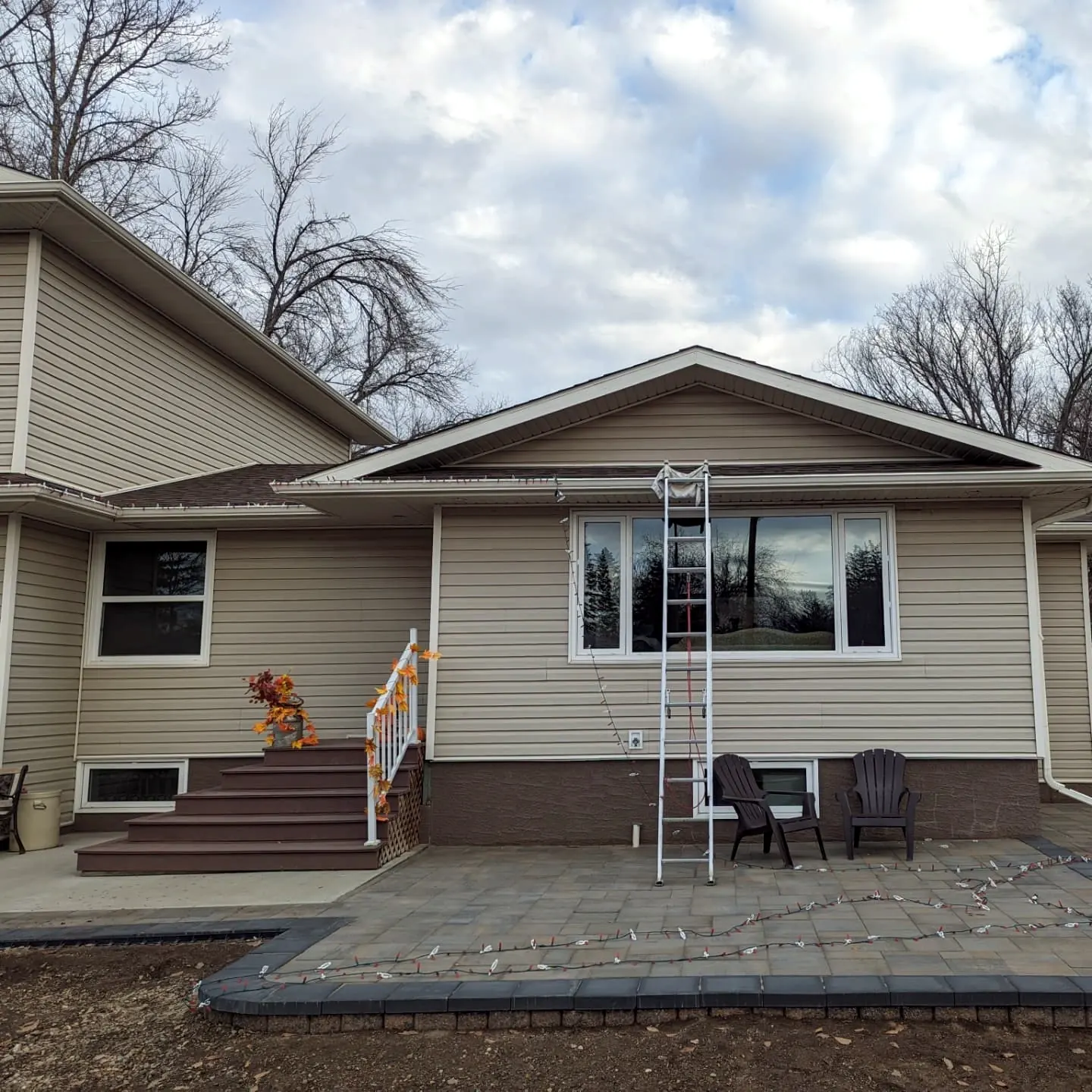 Paver patio behind the house before the pergola was built