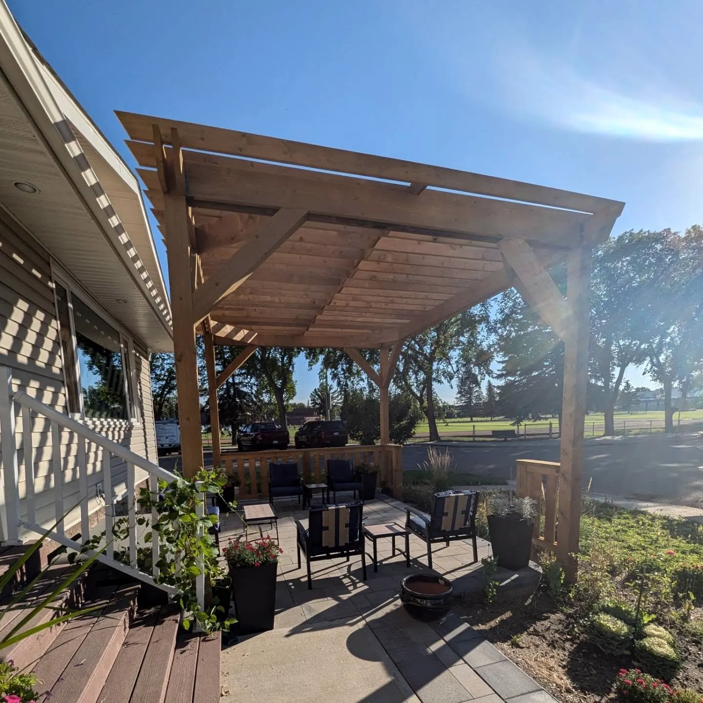 Under the pergola looking out over the patio