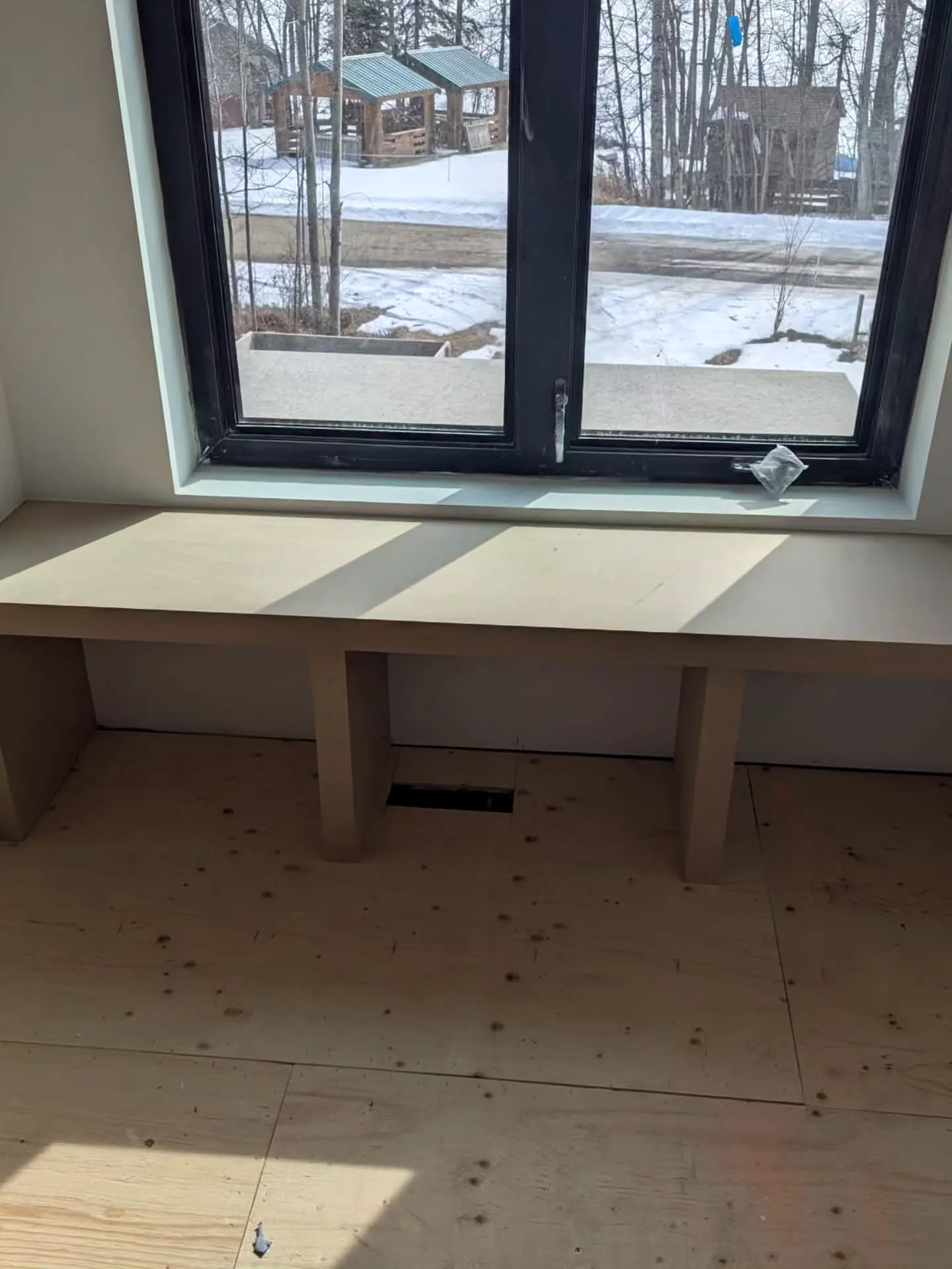 Window bench seat looking out at the trees
