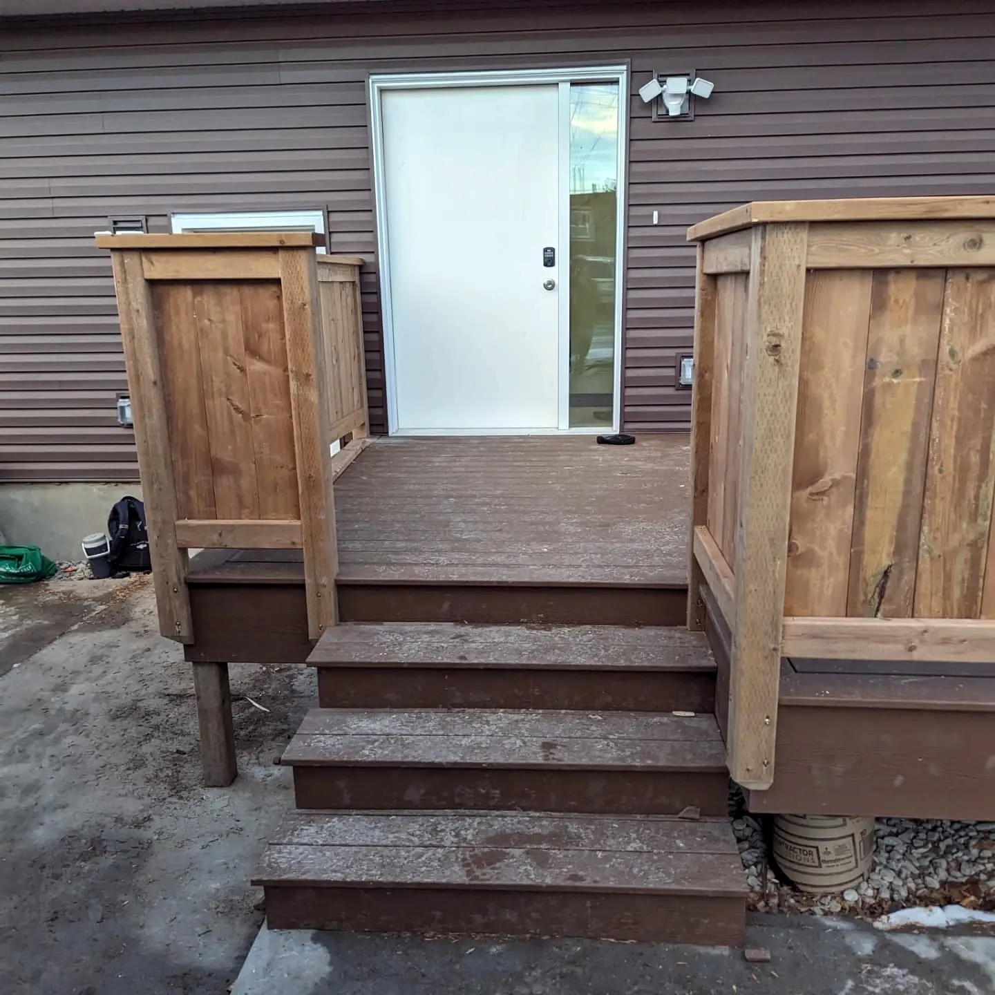 Entry deck and stairs with privacy panels