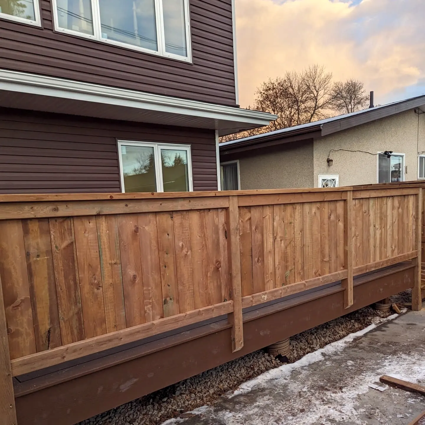 Raised deck with wood privacy railing